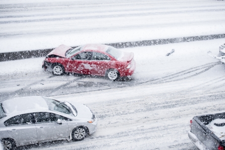 Car crash in bad weather.